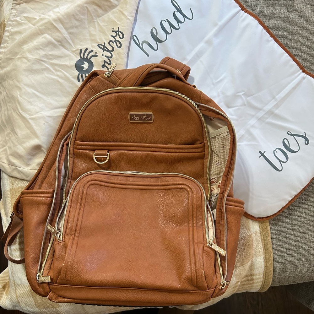 Itzy Ritzy Tan Baby Bag Backpack